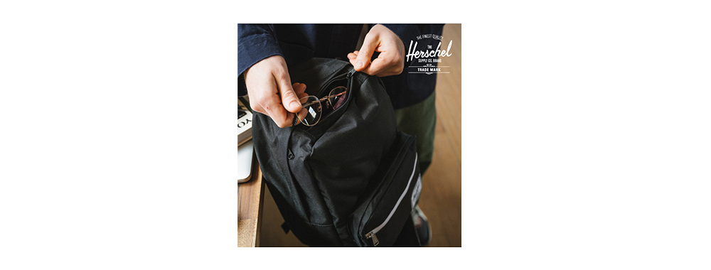The Herschel Pop Quiz features a pocket lined with fleece.